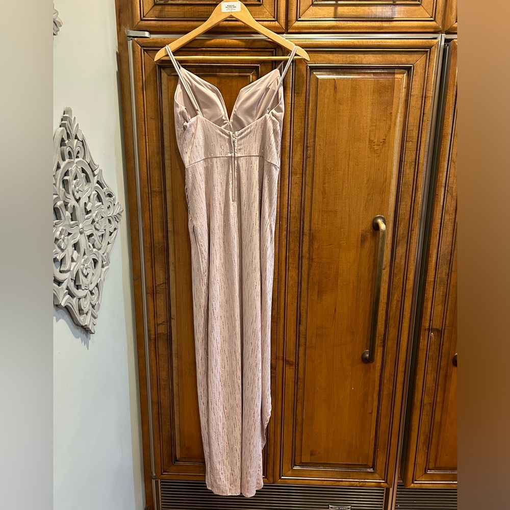 Long gown! Size 9/10 by City Triangles. Adjust. staps/front slit